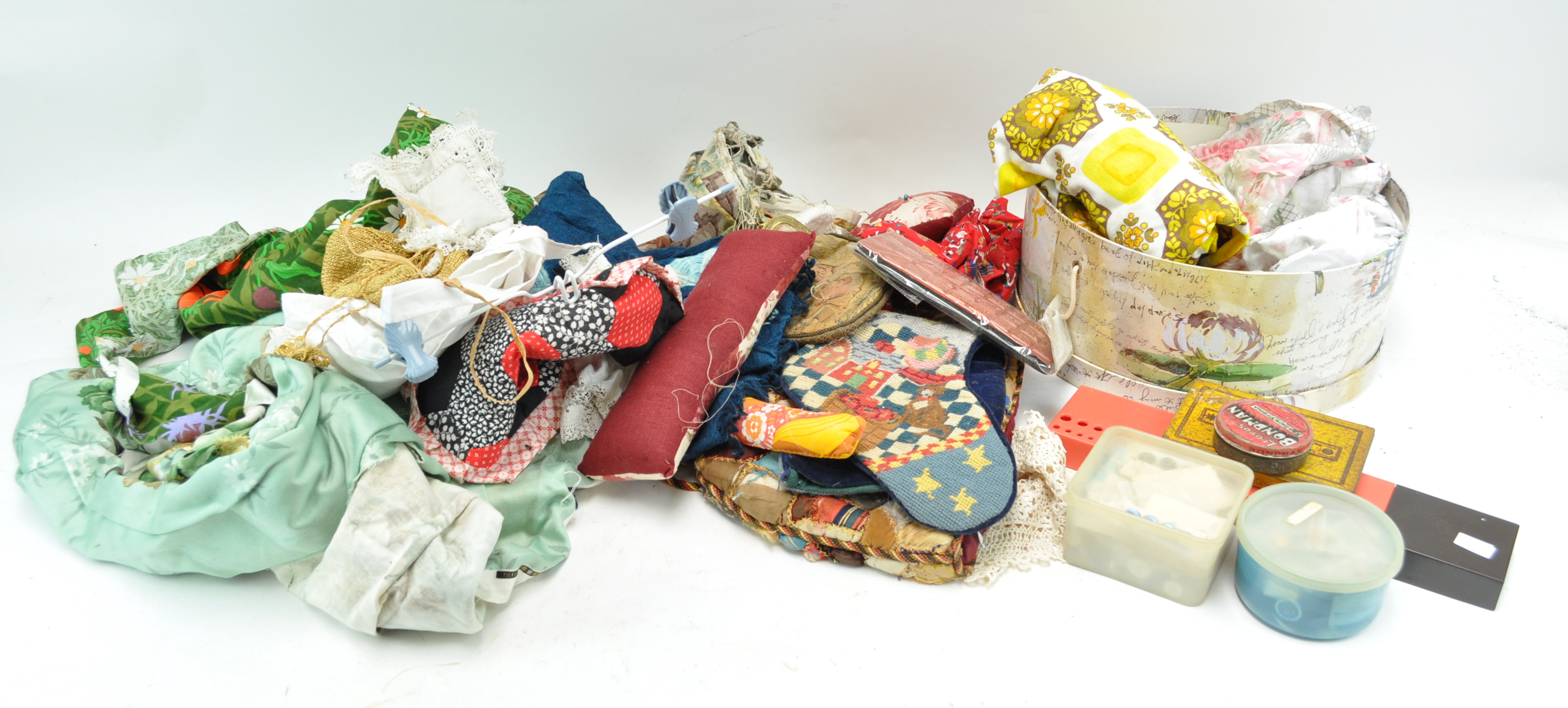 A group of assorted sewing items and fabrics