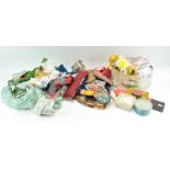 A group of assorted sewing items and fabrics