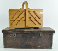 A tool box and a sewing box with contents