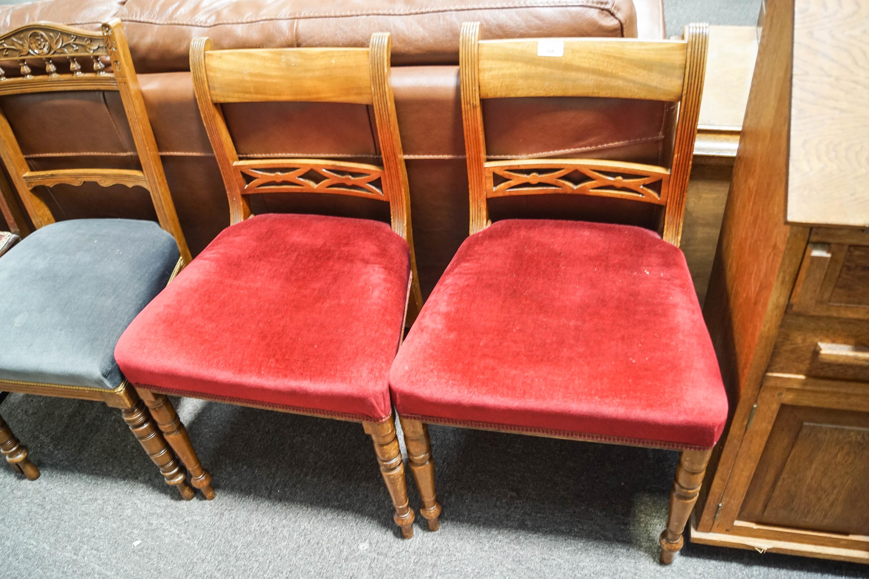 A Victorian mahogany dining chair and a pair of mahogany dining chairs