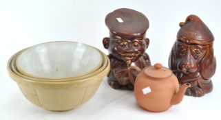 Three pottery kitchen mixing bowls,