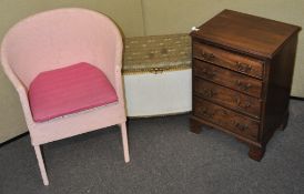 A small mahogany chest of drawers,