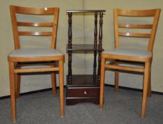 Two chairs and a shelf unit
