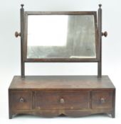 A mahogany Victorian swing mirror with box base,