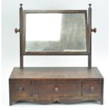 A mahogany Victorian swing mirror with box base,