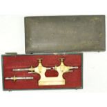 A cased Swiss watchmakers tool,