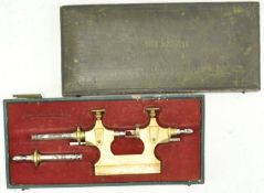 A cased Swiss watchmakers tool,