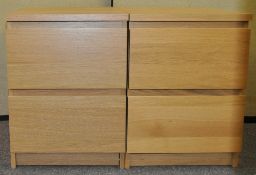 Two wood effect bedside chests of drawers,