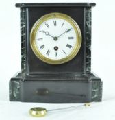 A Victorian black slate and coloured marble clock,