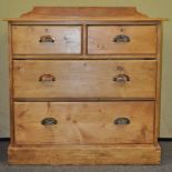 A pine chest of drawers,