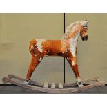 A plush rocking horse,