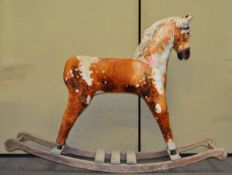 A plush rocking horse,