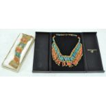 Two boxes of Indian coral and turquoise necklaces and bracelets