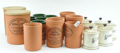 A collection of china and terracotta kitchen containers,