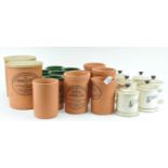 A collection of china and terracotta kitchen containers,