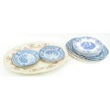 A quantity of 19th century pearlware "Rural Scenes" pattern plates and platters,