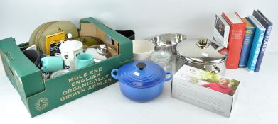 A collection of kitchenware and books,