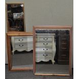 Three mirrors in rectangular wood frames