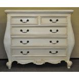 A cream painted chest of drawers