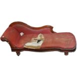 A chaise longue, with shaped back and seat,
