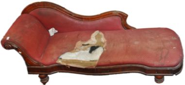 A chaise longue, with shaped back and seat,