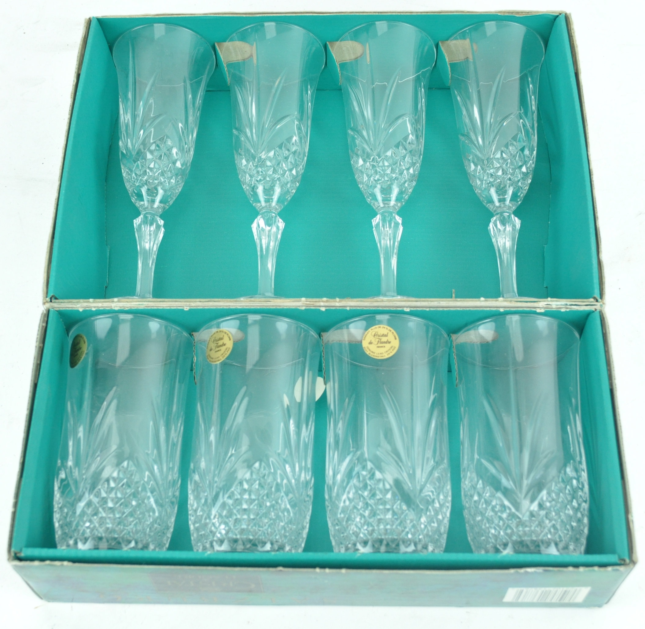 Two boxes of four Saltzburg crystal glasses