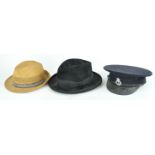 A Policeman's hat and two others