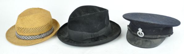 A Policeman's hat and two others