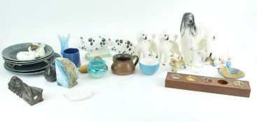 A group of pottery figures of dogs,