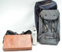 A group of holdalls and attache cases