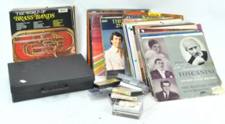 A group of assorted vinyl LP's and cassettes