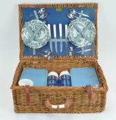 A retro wicker picnic hamper by Brexton,