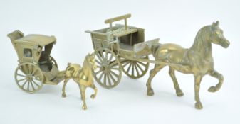A brass horse and cart, and a Hansom cab,