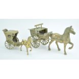 A brass horse and cart, and a Hansom cab,