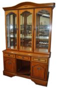 A Clausen & Son wall unit 208cm high