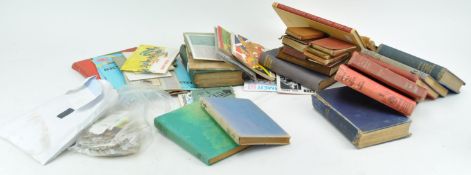 A group of assorted books and stamps