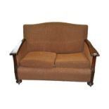 A two seater sofa with oak frame,