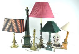 Seven table lamps, the tallest lacking shade,