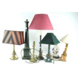 Seven table lamps, the tallest lacking shade,