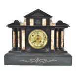 A Victorian slate and marble mantel clock with brass dial,