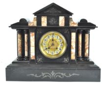 A Victorian slate and marble mantel clock with brass dial,