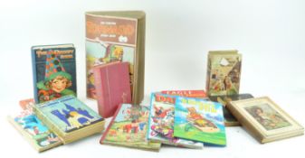 A box of Annuals and children's books