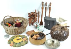 A wicker cat basket and other items