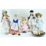 A group of 20th century bisque headed dolls