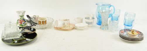 A blue glass lemonade set and other items