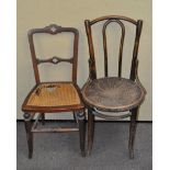 A wicker seated chair together with another