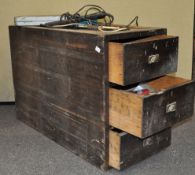 A three drawer chest with tools