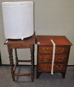 A small chest of drawers,