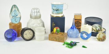 A collection of glass paperweights and other items