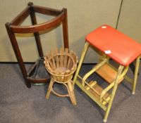 A retro kitchen stool with a set of steps,